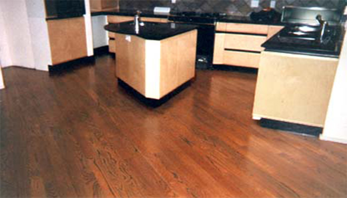 This angled one direction floor of select southern oak and stained rosewood gives new meaning to the phrase dream kitchen.